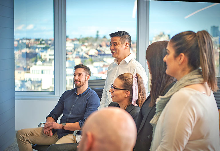 Group of engaged employees in meeting